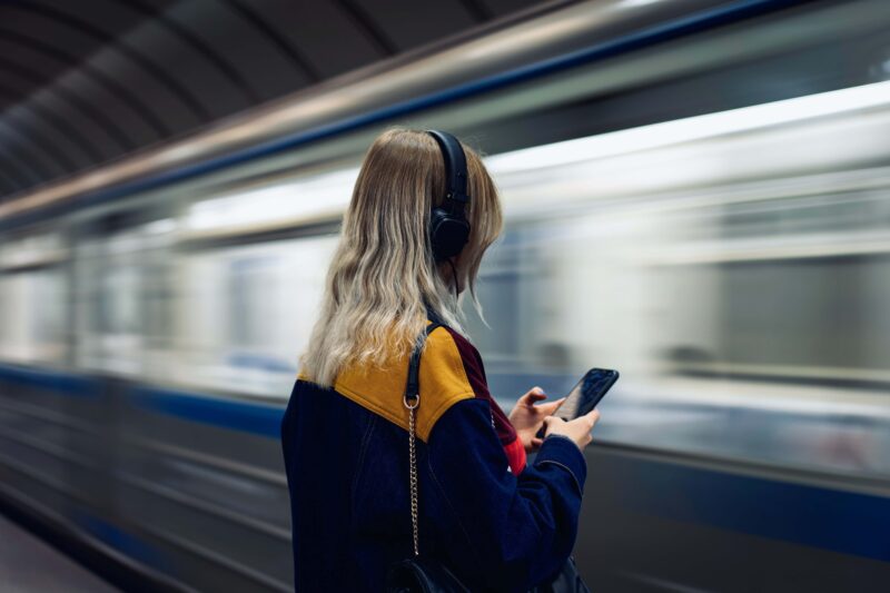 Girl waiting on a train