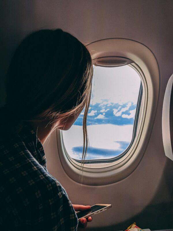 Person looking out window